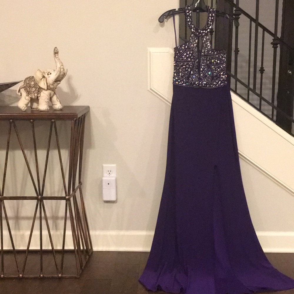 Purple strapless dress.